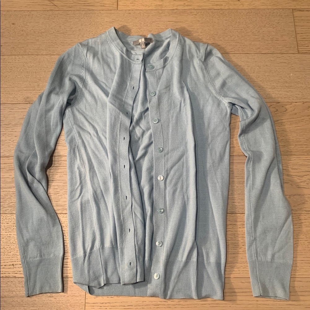 Grey cardigan.